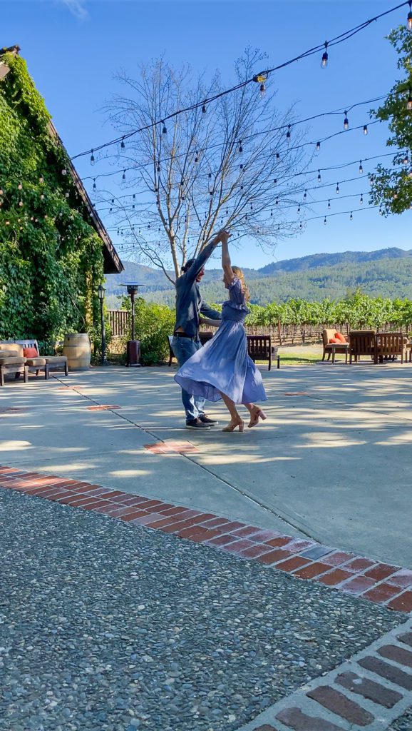 Wearing Flowy Blue Cottagecore Dress while Dancing with Husband